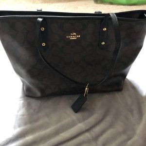 Black & brown leather like material coach monogram